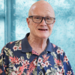 Elderly man in Hawaiian shirt